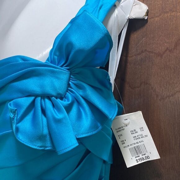 Davids Bridal Gown. Teal in color. In perfect condition. NWT. Women’s 8. - Picture 12 of 16